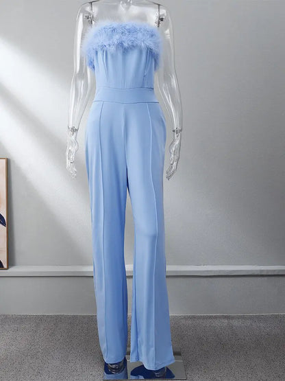 Dames jumpsuit met pailletten en verenpanelen
